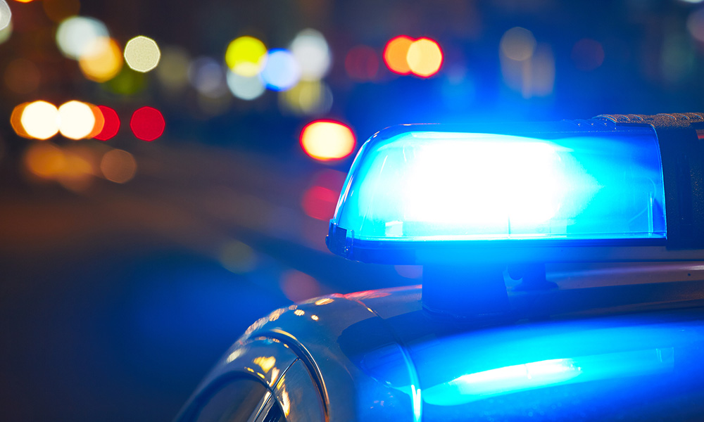 Police car on the street at night